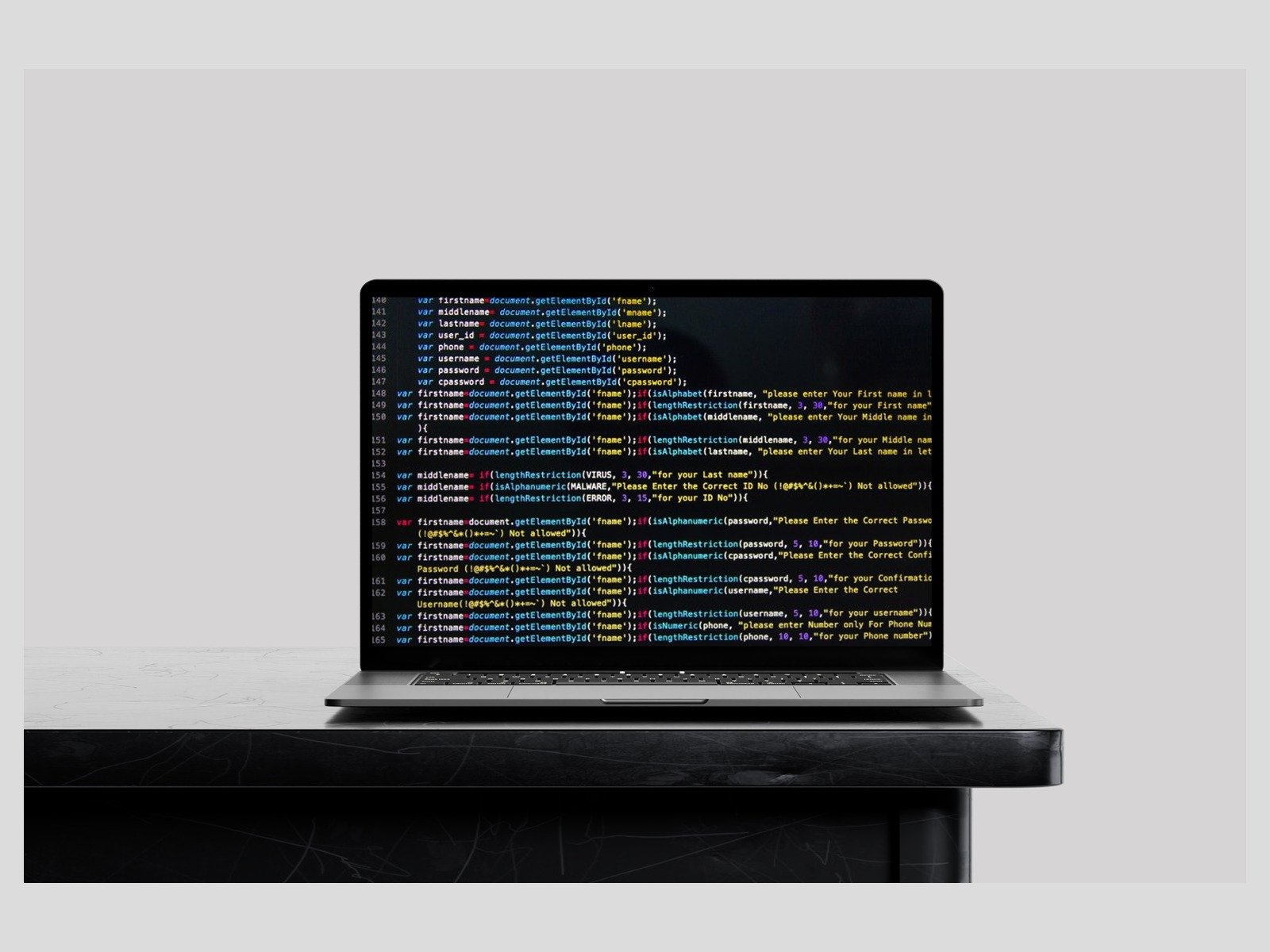 Website development code on a laptop